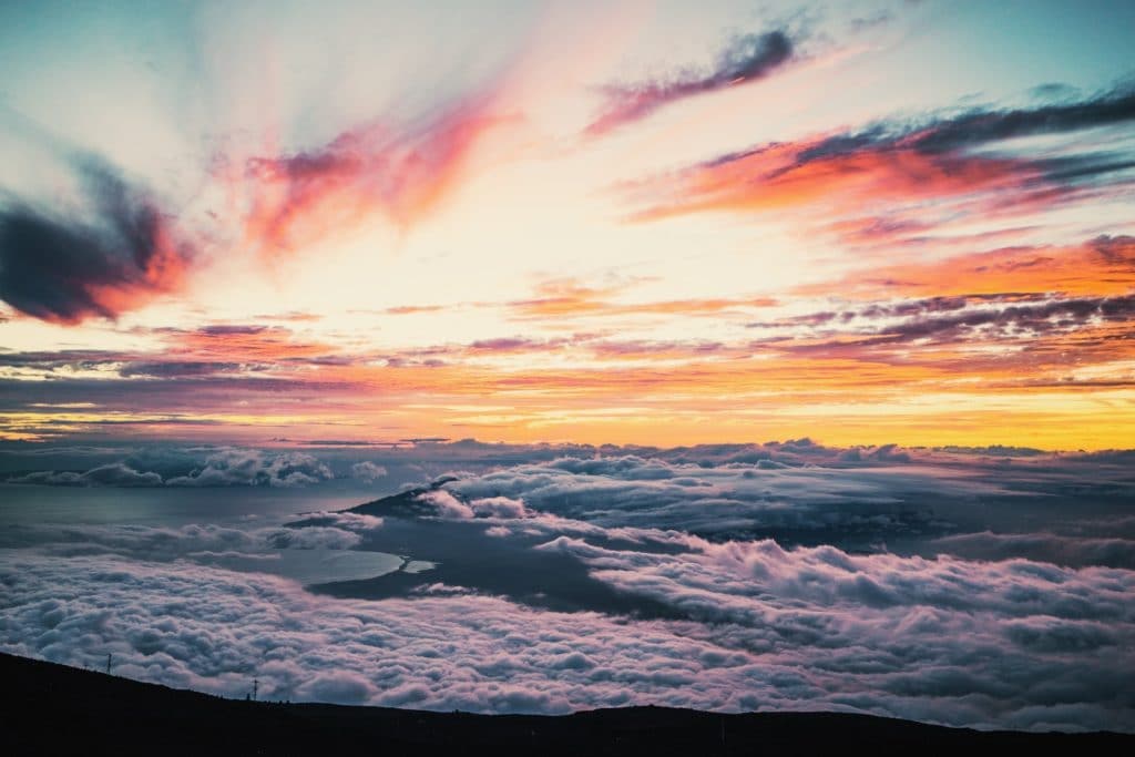 sunset and clouds with purple and reds