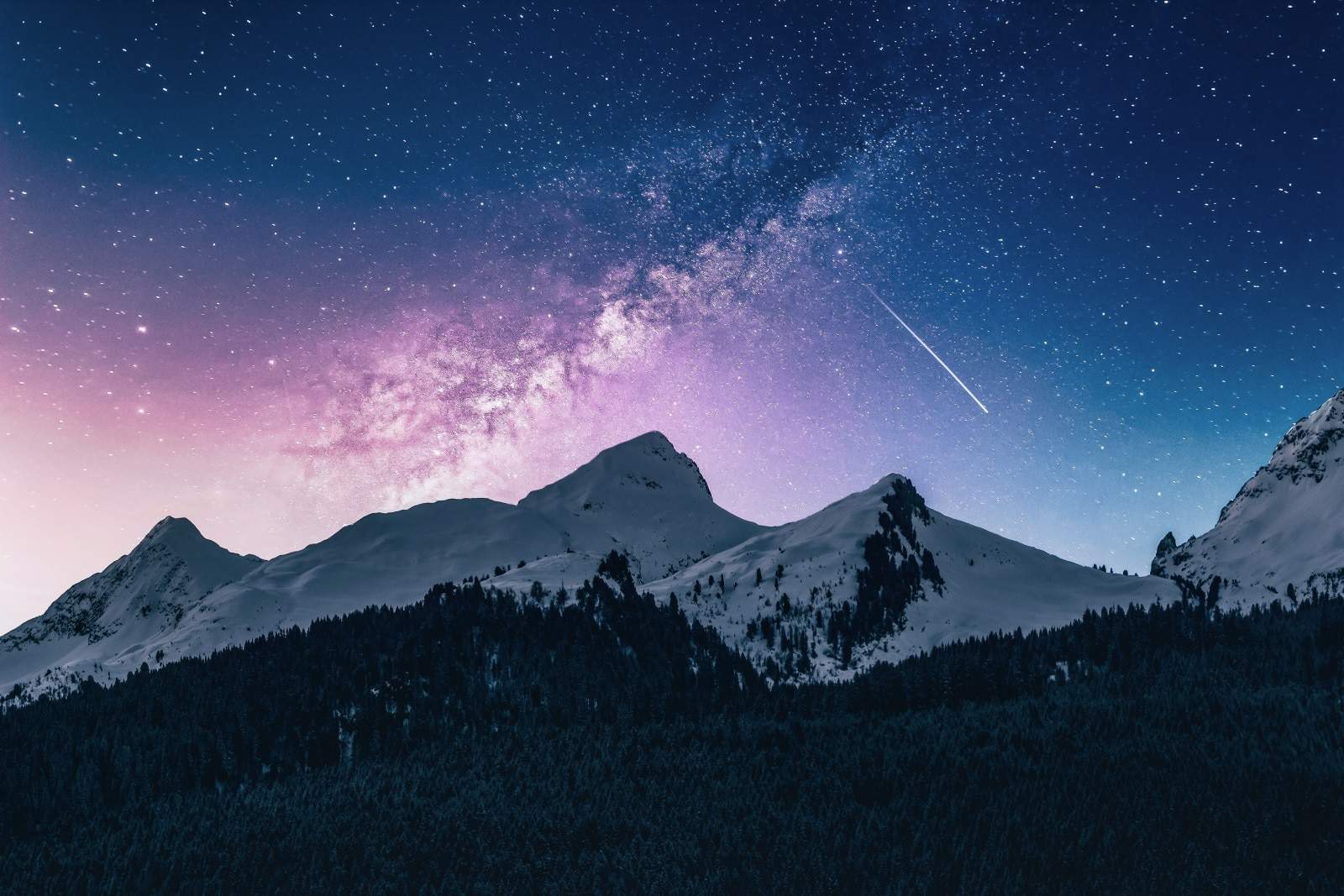 stunning mountain sky with shooting star