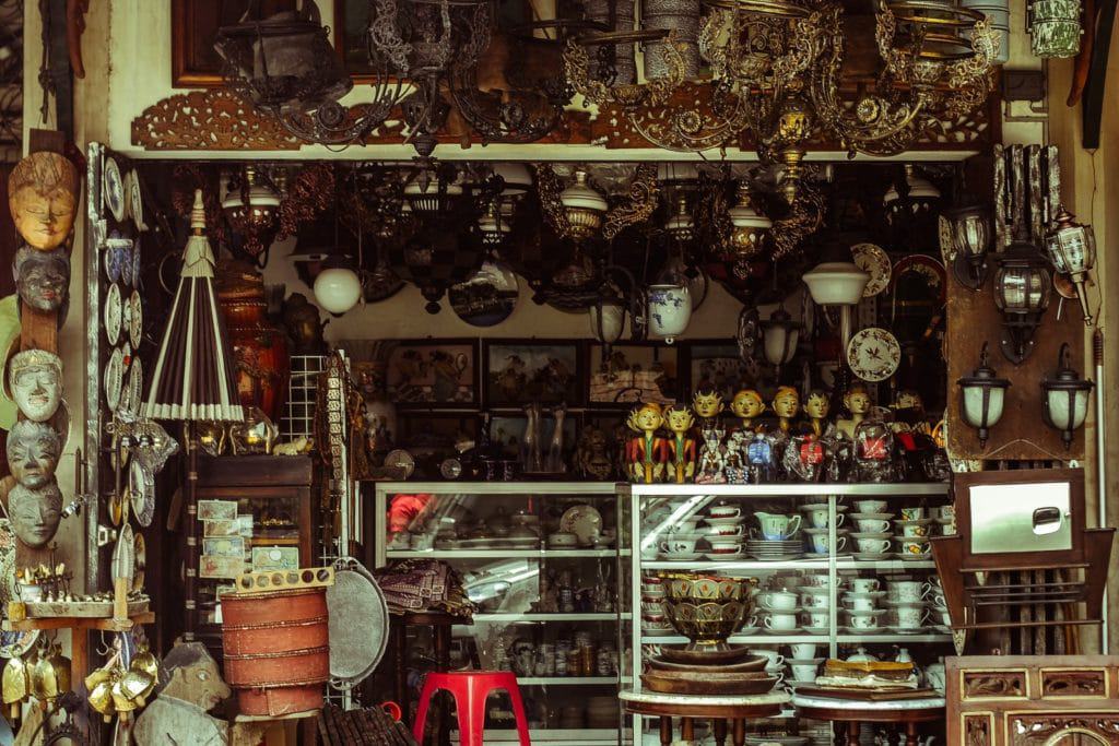 antique shop with lots of brass and jars