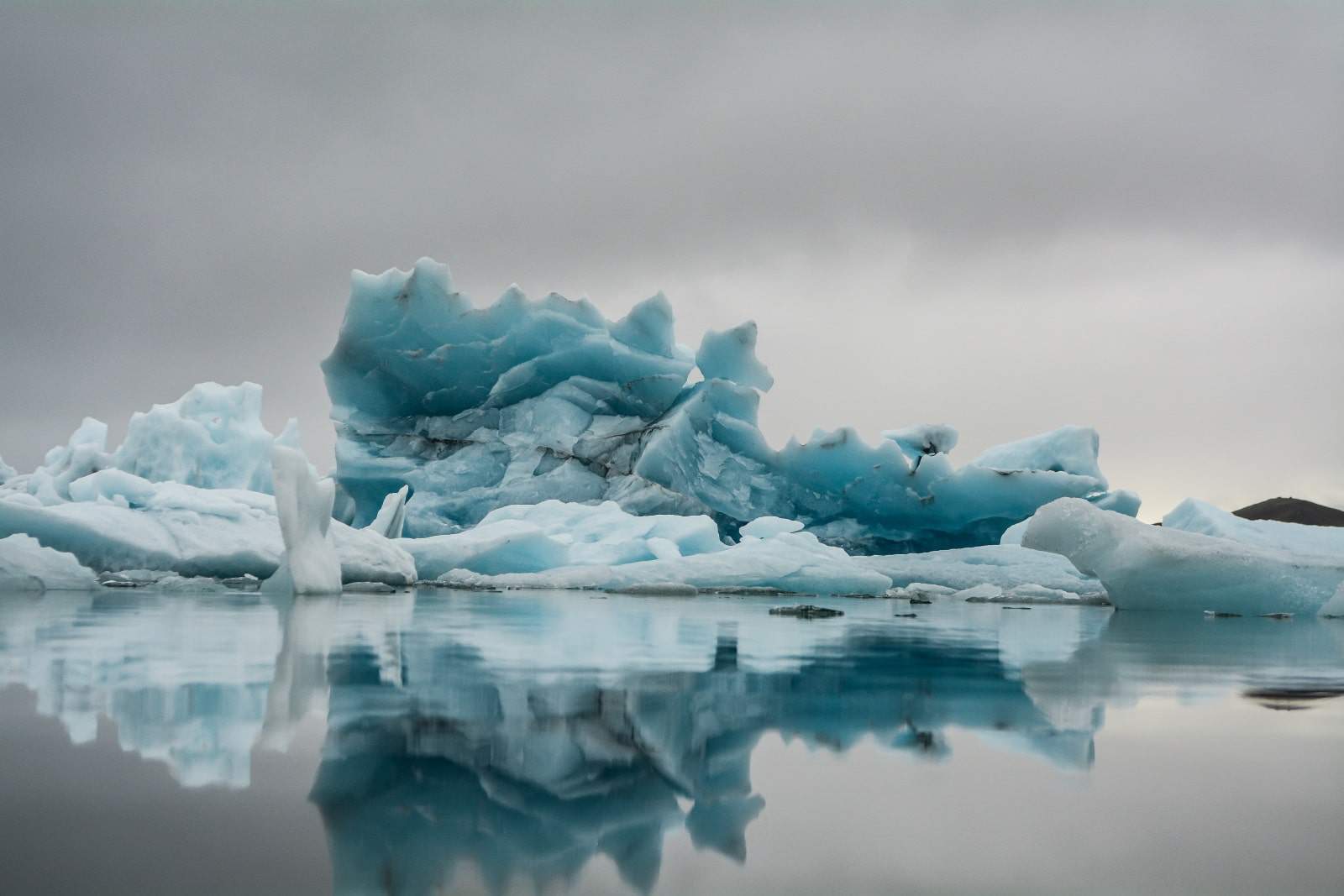 water and ice in a blue iceburg