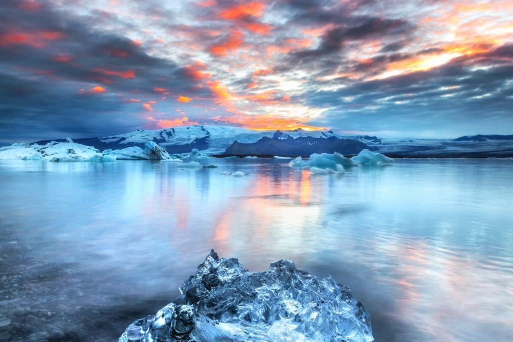 stunning sunset over water and ice