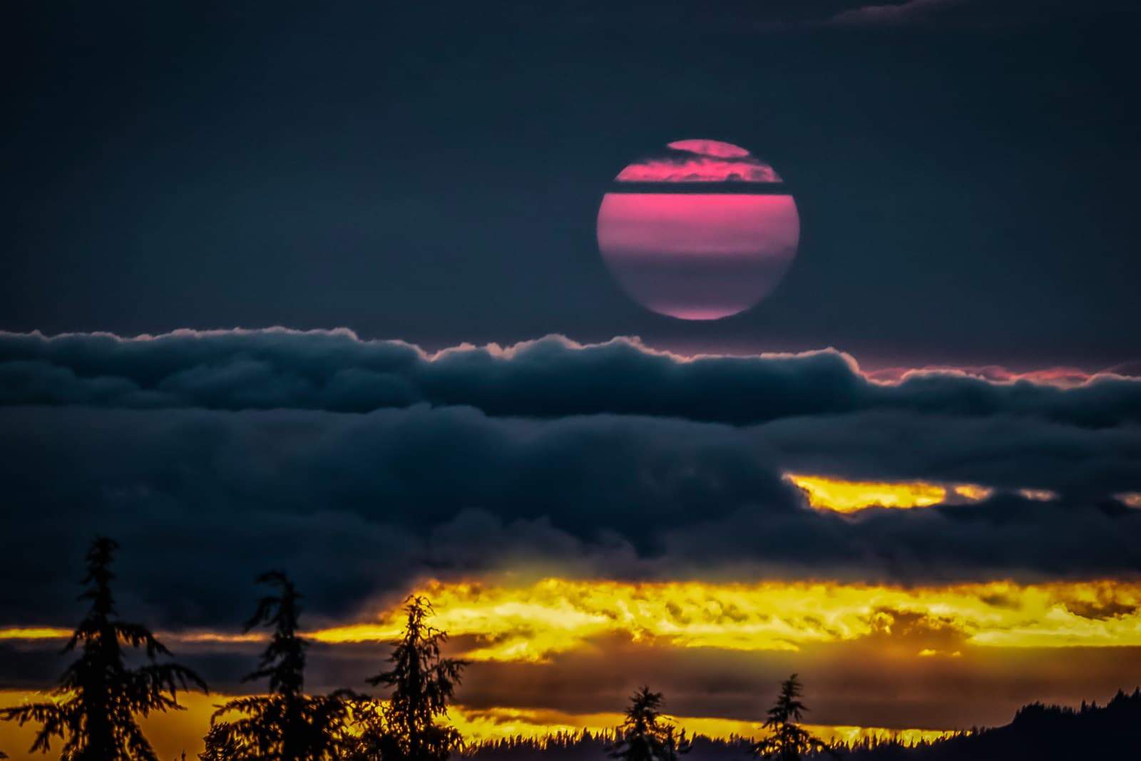 sunset with purple sun and yellow light