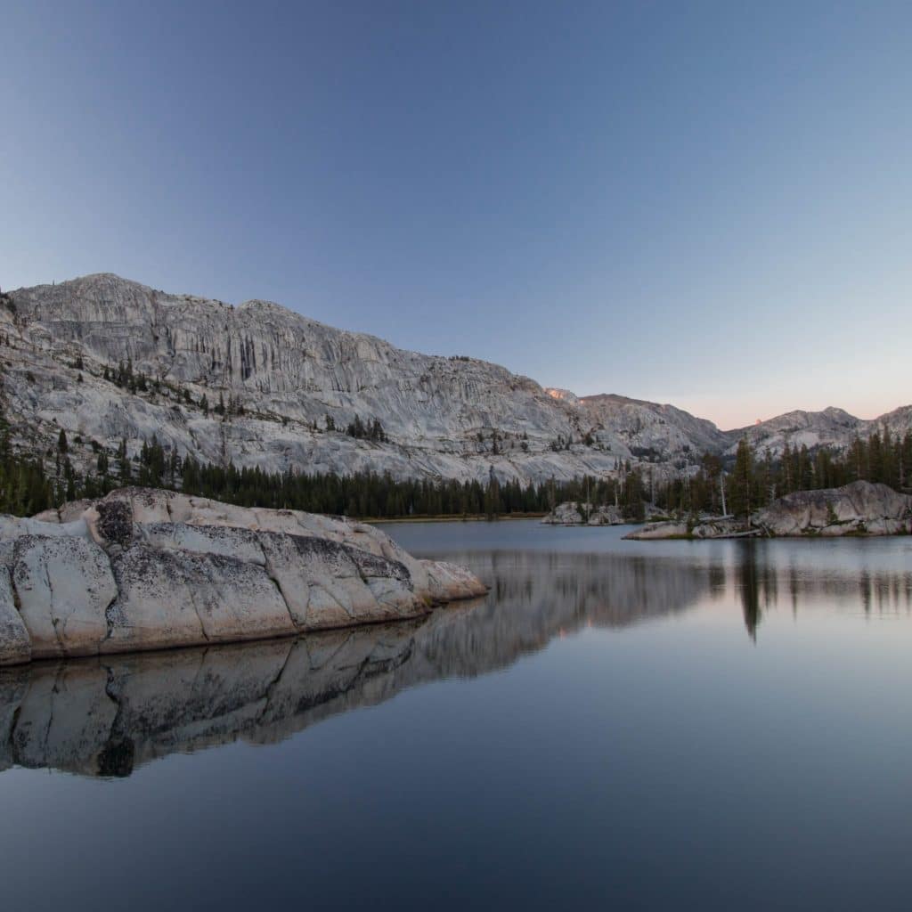 still lake and boulders