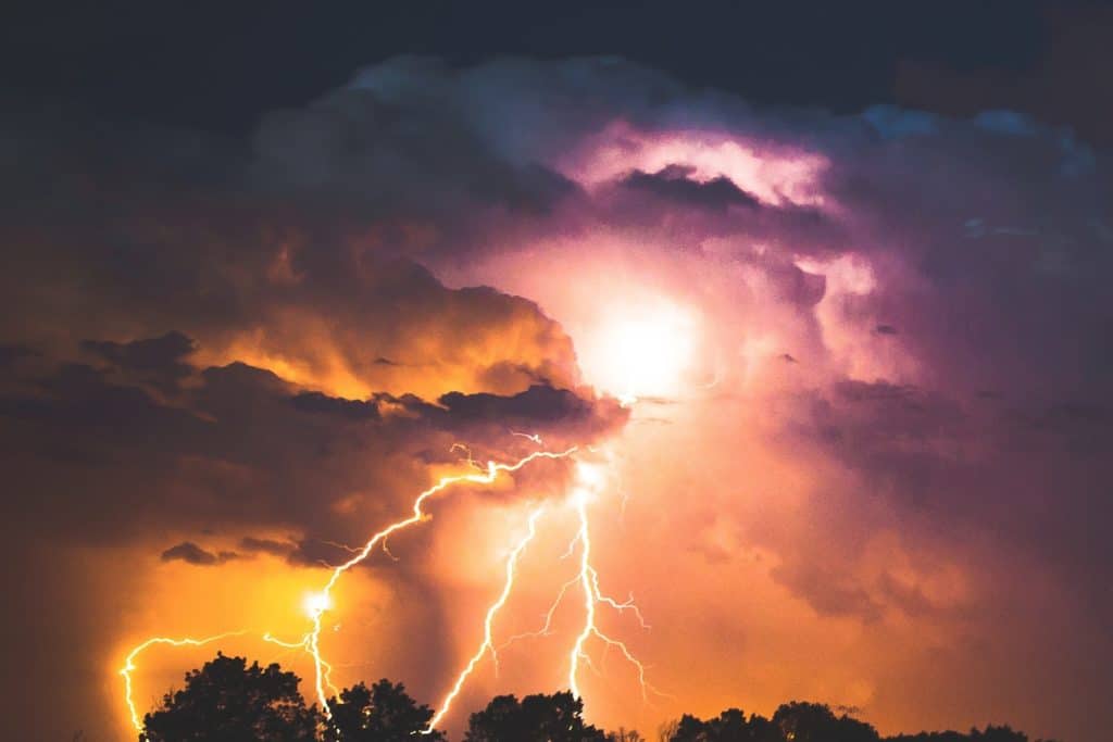 sun shining through thunderstorm