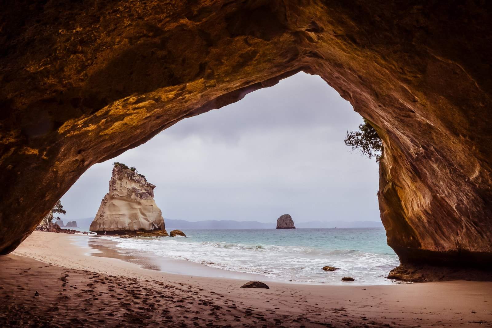 stone opening on beach