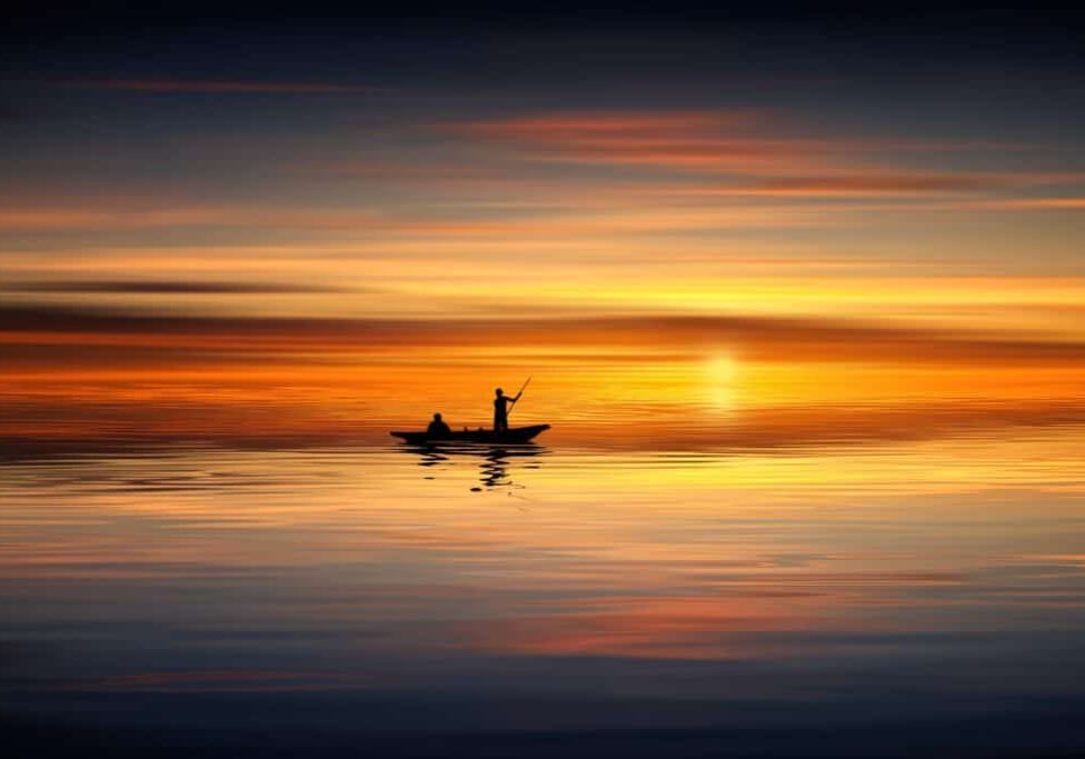 fishing boat in stunning sunset